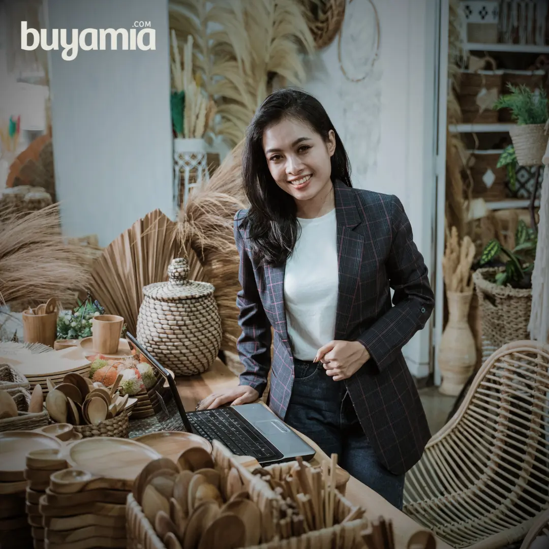 Lady standing among woven products